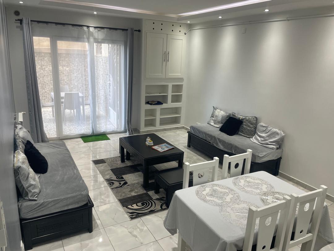 Salon avec terrasse