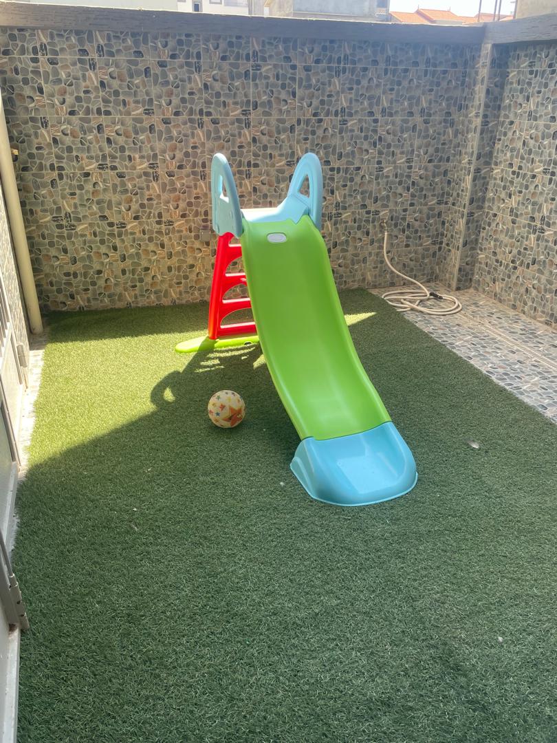 Terrasse gazon toboggan