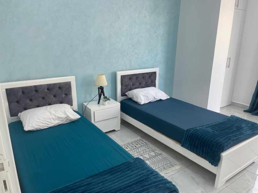 Chambre lits simples bleu